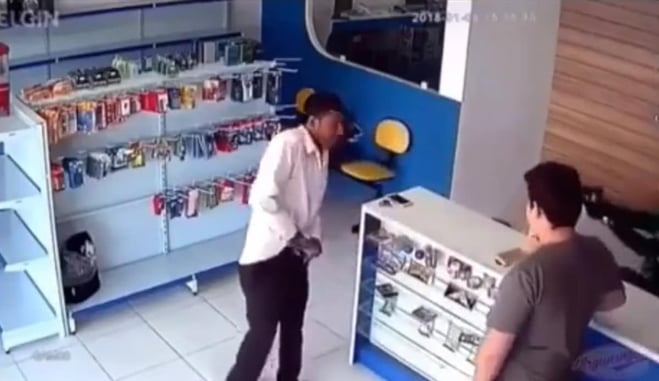 [WATCH] The Last Thing This Guy Does Is Draw His Gun, But The Armed Citizen Behind The Counter Is Quicker
