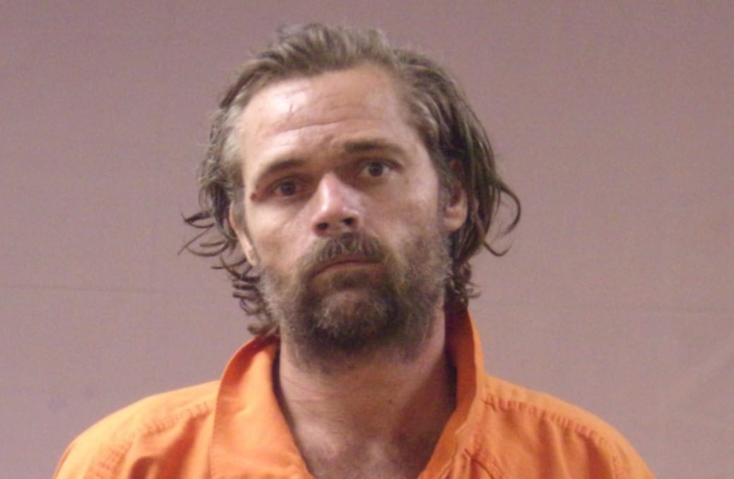 Fugitive Located By An Armed Property Owner And His Dog, Held At Gunpoint Until Police Arrive