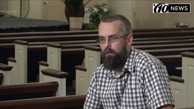 Burglar held at gunpoint by pastor after breaking into church, apologizes while being taken away by police