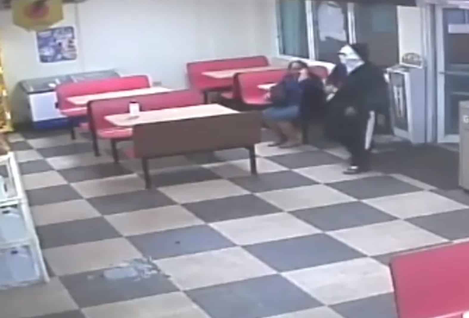 [VIDEO] Armed Robber Has No Idea Armed Resistance Is Right Next To Him