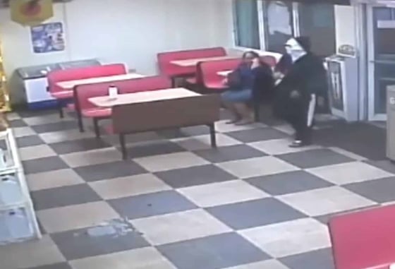 [VIDEO] Armed Robber Has No Idea Armed Resistance Is Right Next To Him