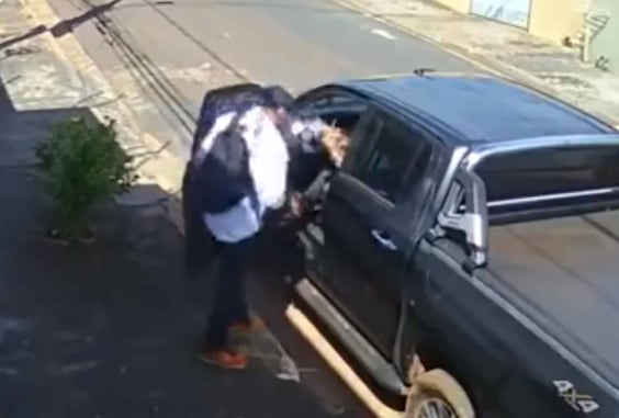 Armed Robber Is Immediately Shot In The Face As Soon As The Door Opens During His Carjacking Attempt