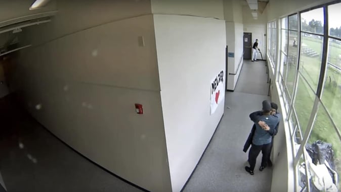 [WATCH] School Security Guard Disarms Student With Shotgun, Immediately Gives Him Hug