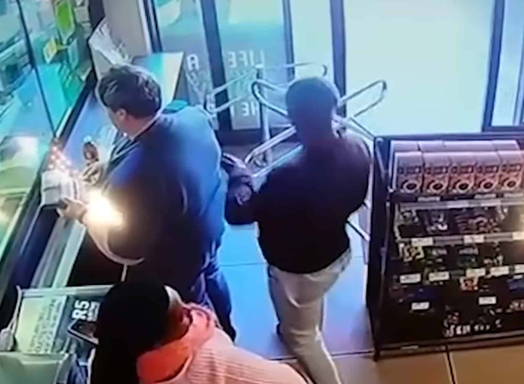 [VIDEO] Armed Officer Has Gun Taken Right Out Of Holster While In Line At Convenience Store