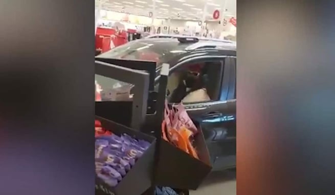 Suspect Drives Car Through Target Store, Shoppers Panic, Device Dropped On Ground
