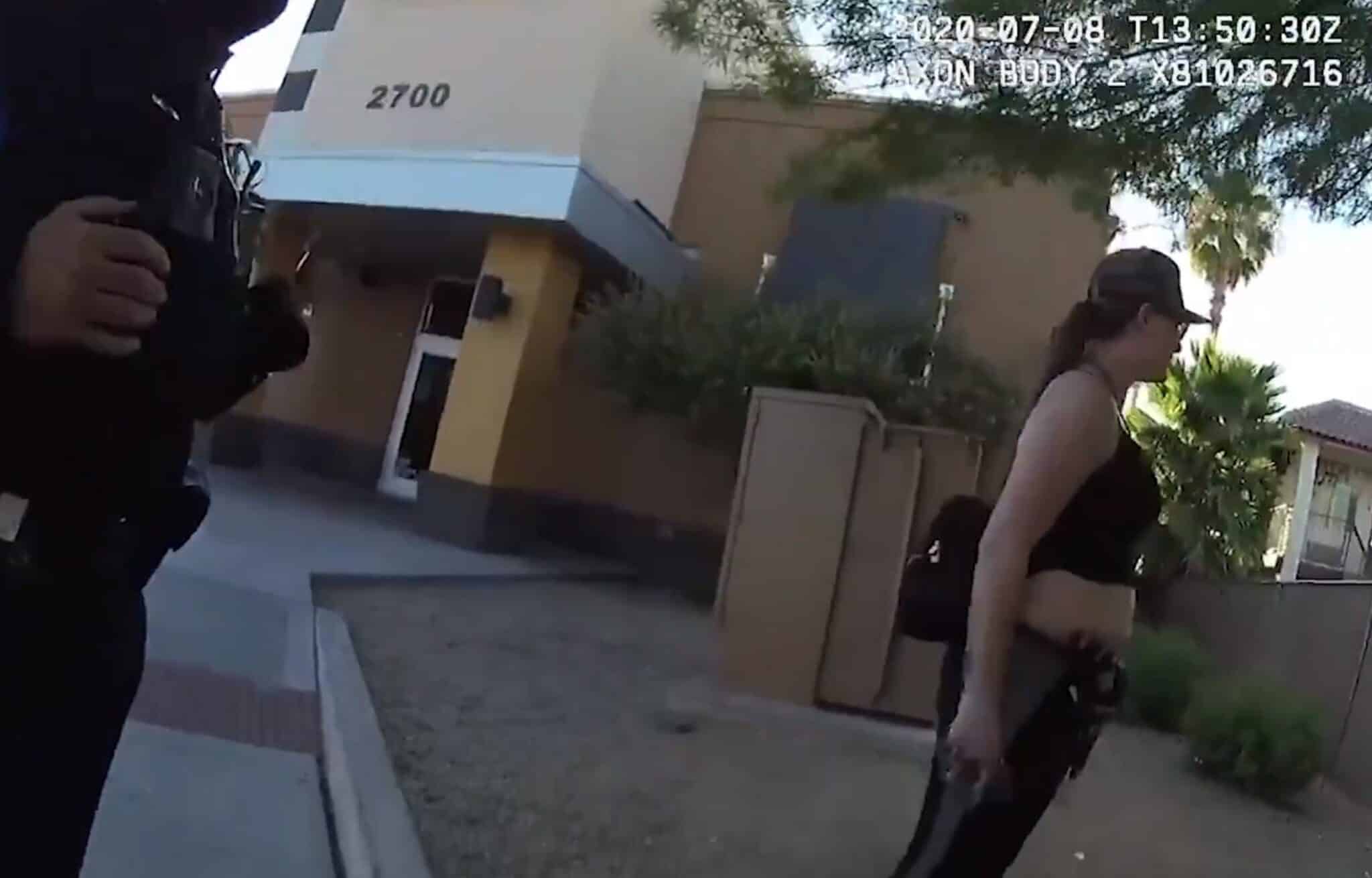 [VIDEO] Woman With Concealed Gun Nearly Shoots Officers During Bizarre Exchange
