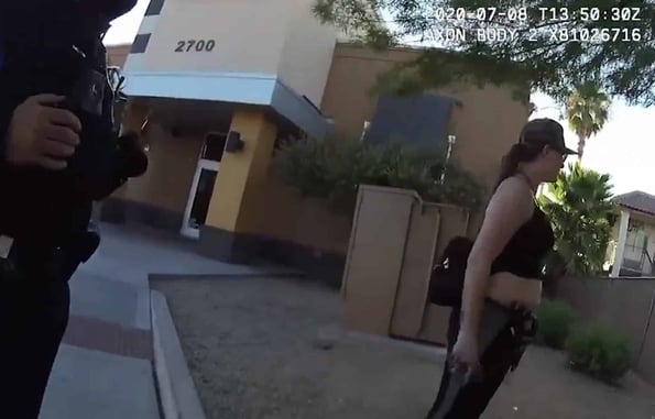 [VIDEO] Woman With Concealed Gun Nearly Shoots Officers During Bizarre Exchange