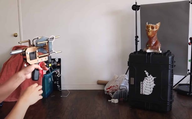 This Guy Made A Gun That Shoots Masks On People’s Faces – VIDEO