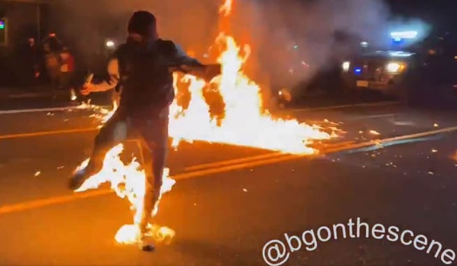 [VIDEO] Rioter Hit With Molotov Cocktail Meant For Police, Set On Fire, Police Come To His Aid