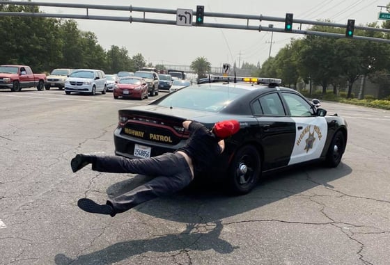 California Highway Patrol Hits The Gas After Protester Jumps On Hood Of Vehicle