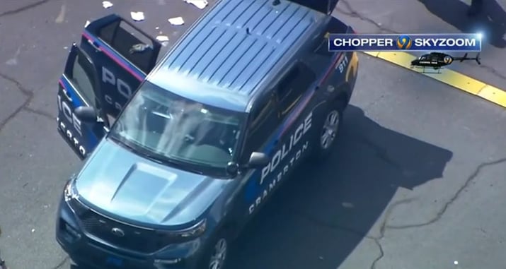 Man Shot While Being Detained in Back Seat of Patrol Car