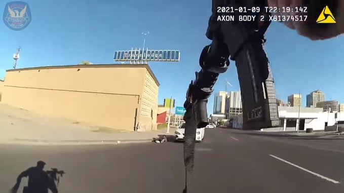 Intense Video Shows Officer Shooting Armed Man That Was Holding Gun To Baby In The Middle Of The Street