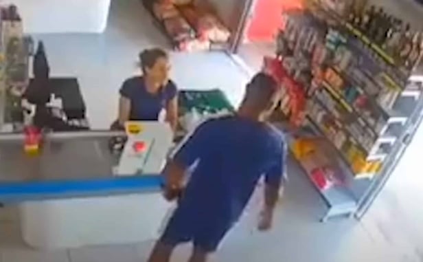WATCH: Man Has Incredibly Fast Draw Against Bad Guy Who Comes Out Of Nowhere