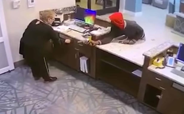 *GRAPHIC WARNING* Hotel Manager Fully Complies With Armed Robber, But He Murders Her Anyway