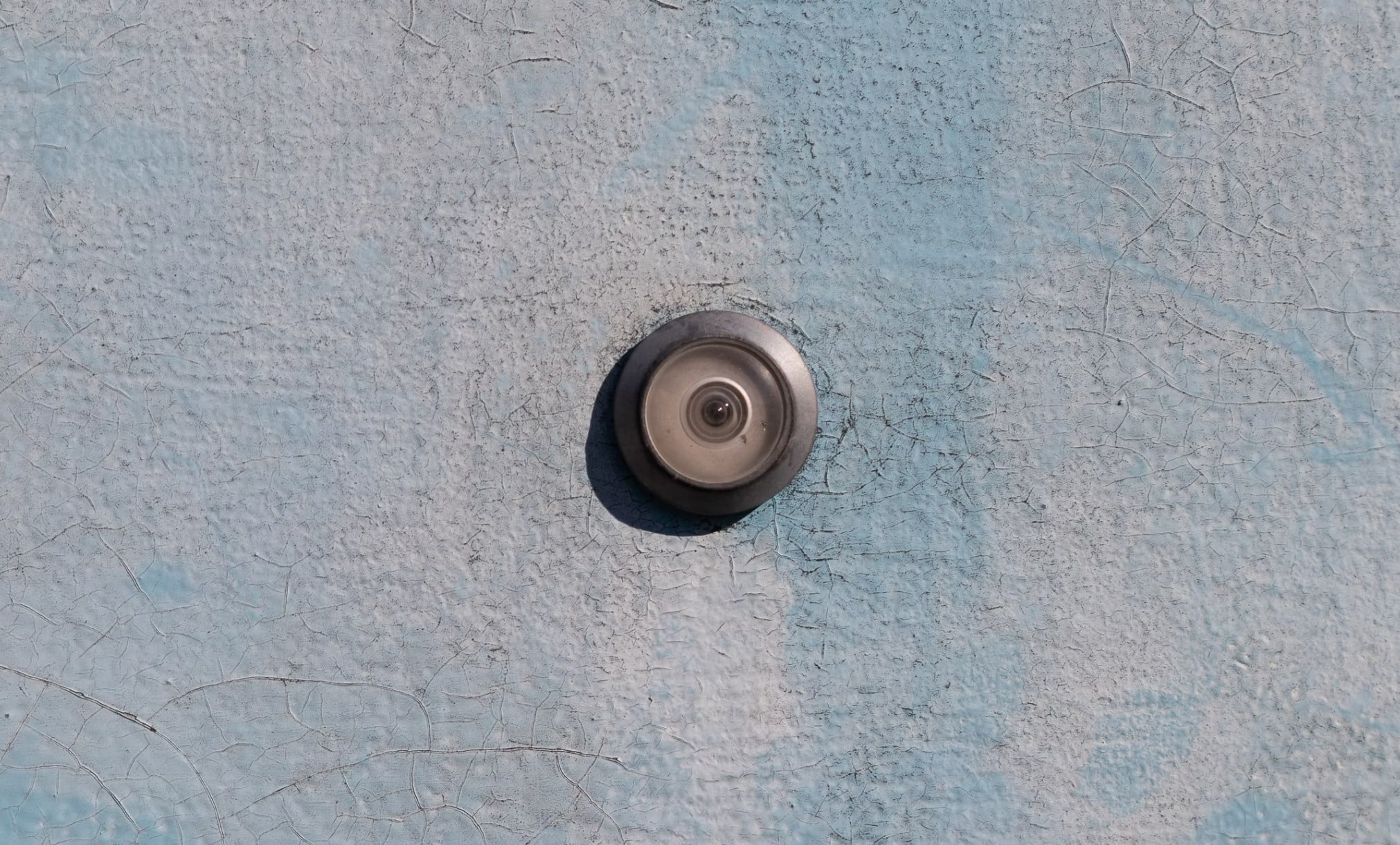 Woman Shot In The Eye While Looking Through Peephole On Her Apartment Door