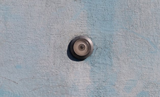 Woman Shot In The Eye While Looking Through Peephole On Her Apartment Door