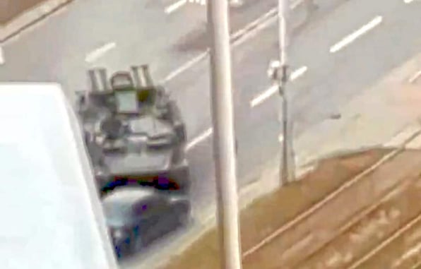 GRAPHIC WARNING: Civilian Run Over By Russian Tank While Driving, More Ukrainians Taking Up Arms And Fighting