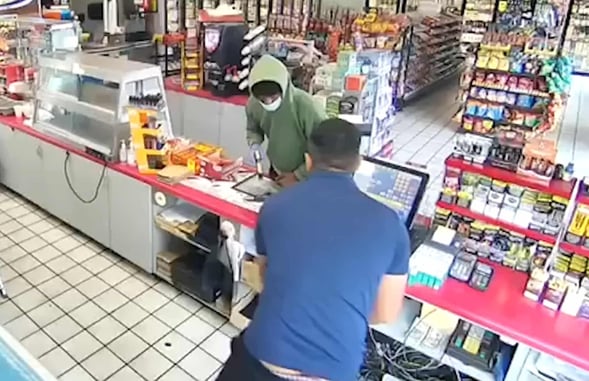 Shocking Video Shows Armed Robber Not Giving A Second Thought To Murdering Store Employee
