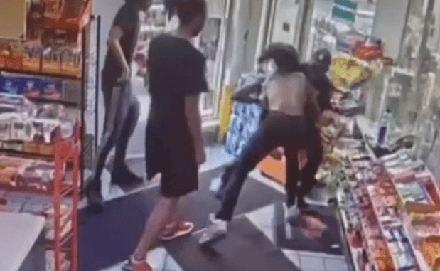 WATCH: Suspects Try Stealing Gun Right Off Of Police Officer At Gas Station