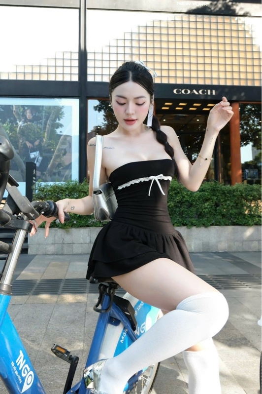 THAOBIBI Short Flared Knit Dress with Bow and Ruffle Detail