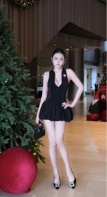 THAOBIBI Sleeveless V-Neck Mini Dress with Bow Detail