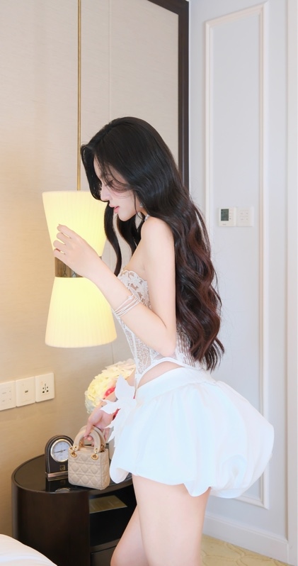 THAOBIBI Lace Bustier Top and White Shorts Set