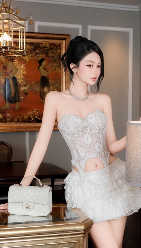 THAOBIBI Lace Top and Ruffle Skirt Set with Rhinestone Accents