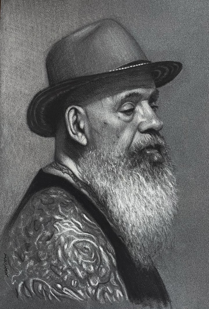 John in a trilby hat