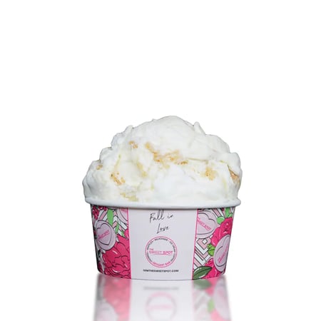 Banana ice cream with sweet marshmallow swirls and crunchy vanilla wafer cookies for a nostalgic treat.
