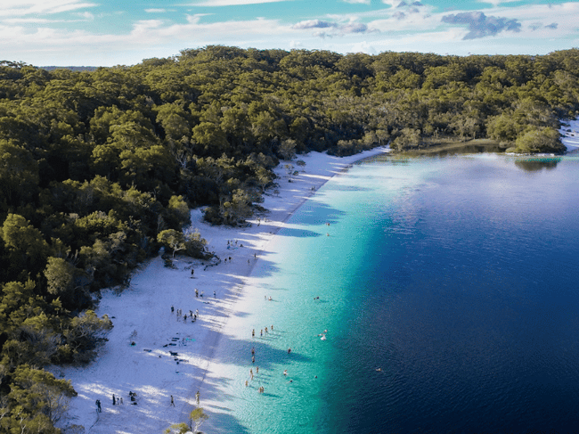 Aerial view of swimmers at Lake McKenzie K'gari Fraser Island