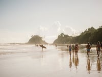 http://East%20Coast%20Australia%20itinerary%20featuring%20surfers%20at%20Byron%20Bay%20beach