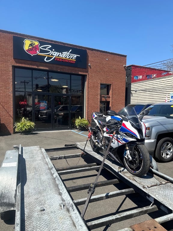 SIGNATURE PRE-OWNED