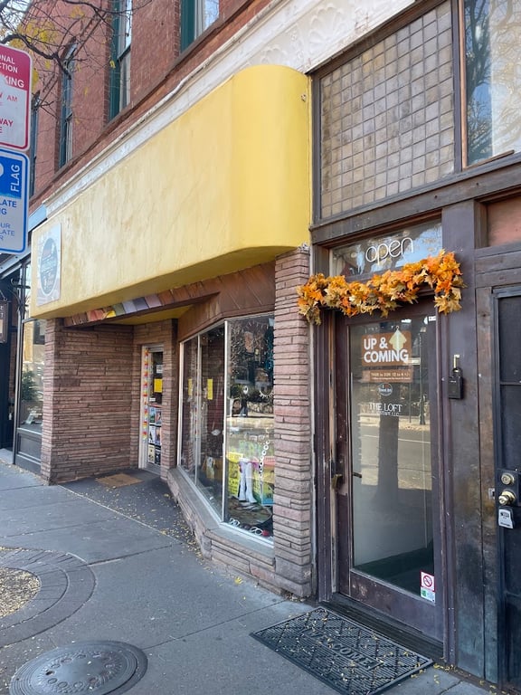 Up & Coming Boutique & Gallery