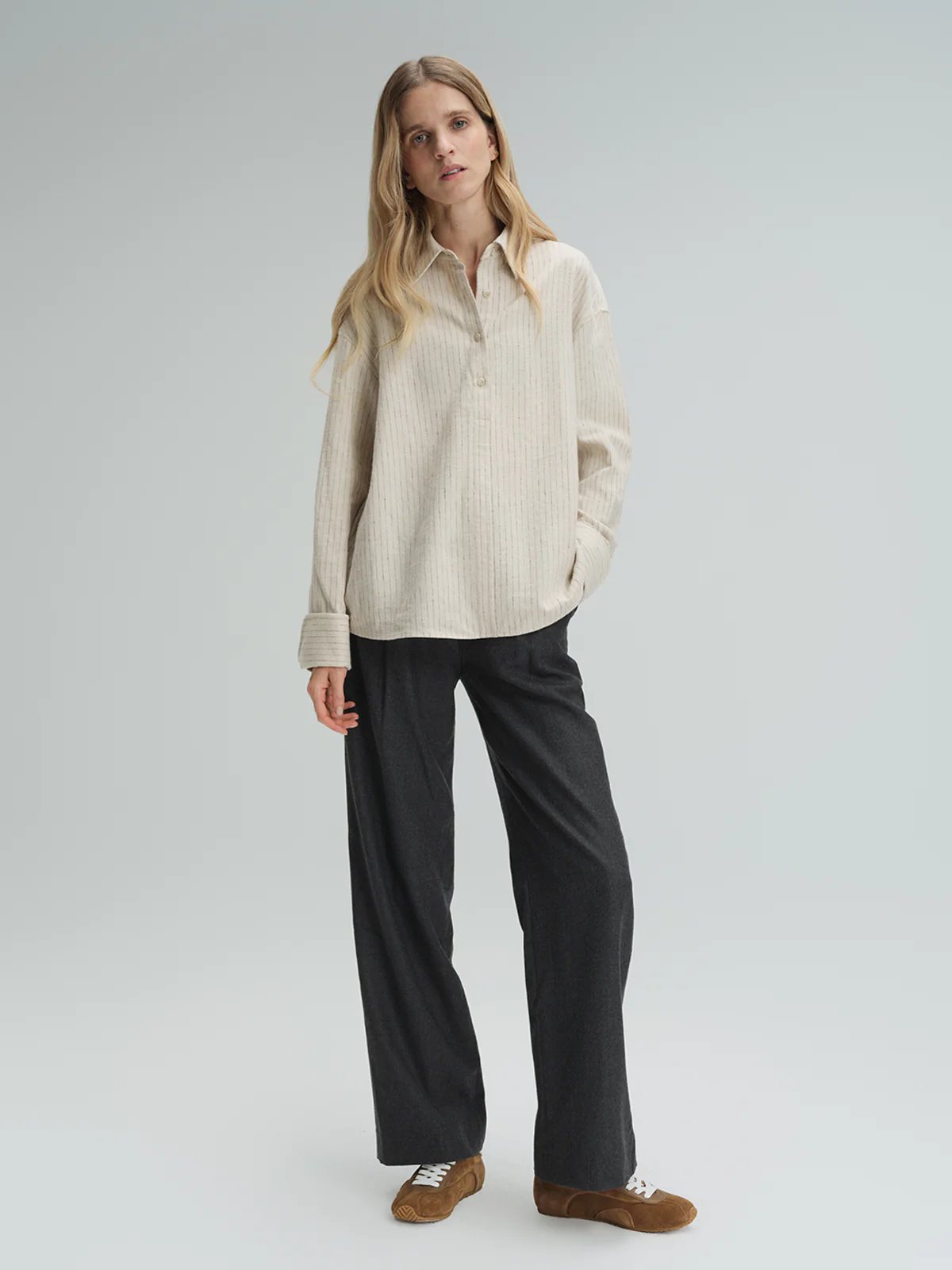 andreatang dark grey wool straight-leg trousers with oversized beige shirt and sneakers