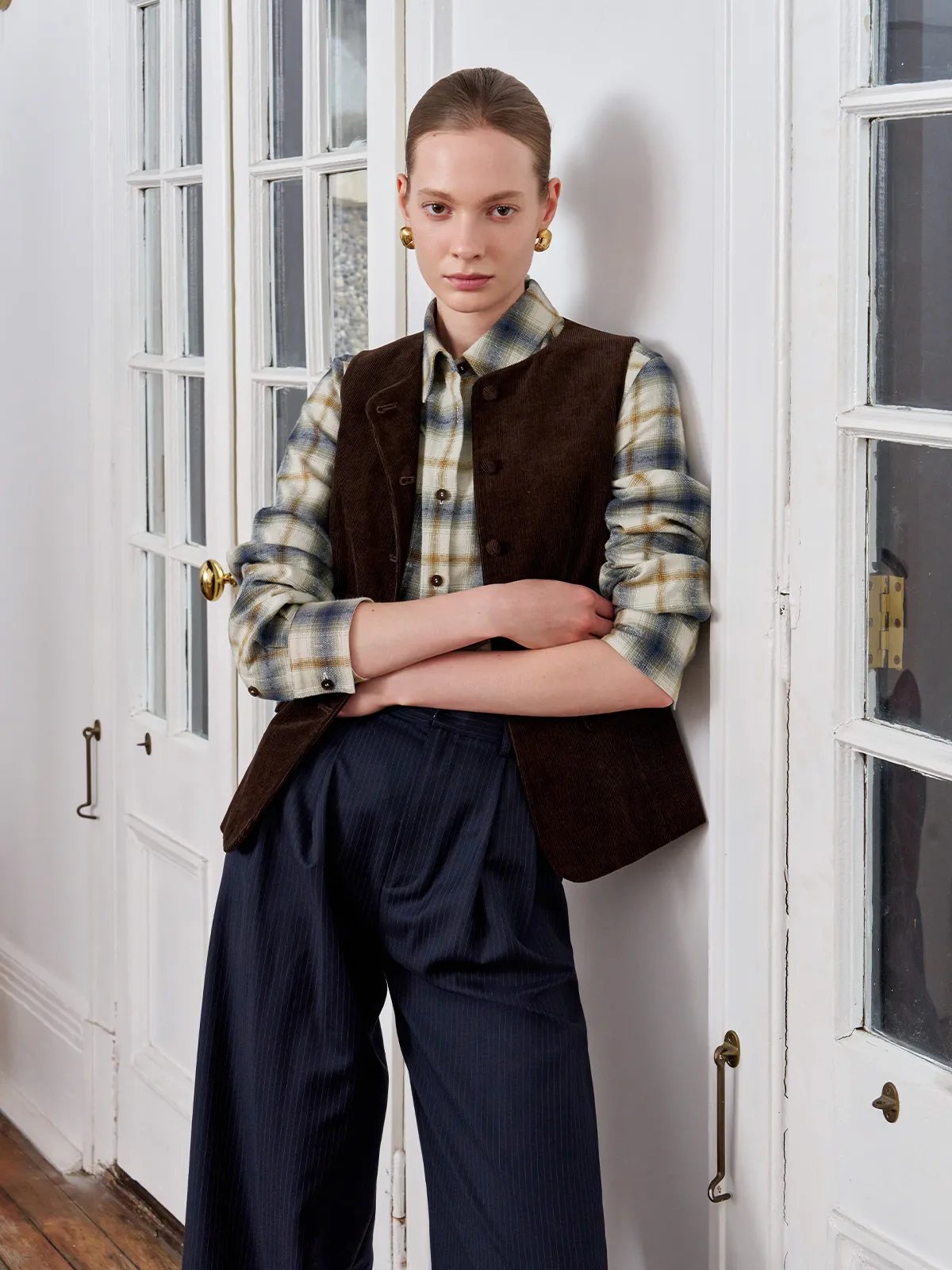Andreatang BRAMBLE shirt layered under brown corduroy vest with navy pinstripe trousers