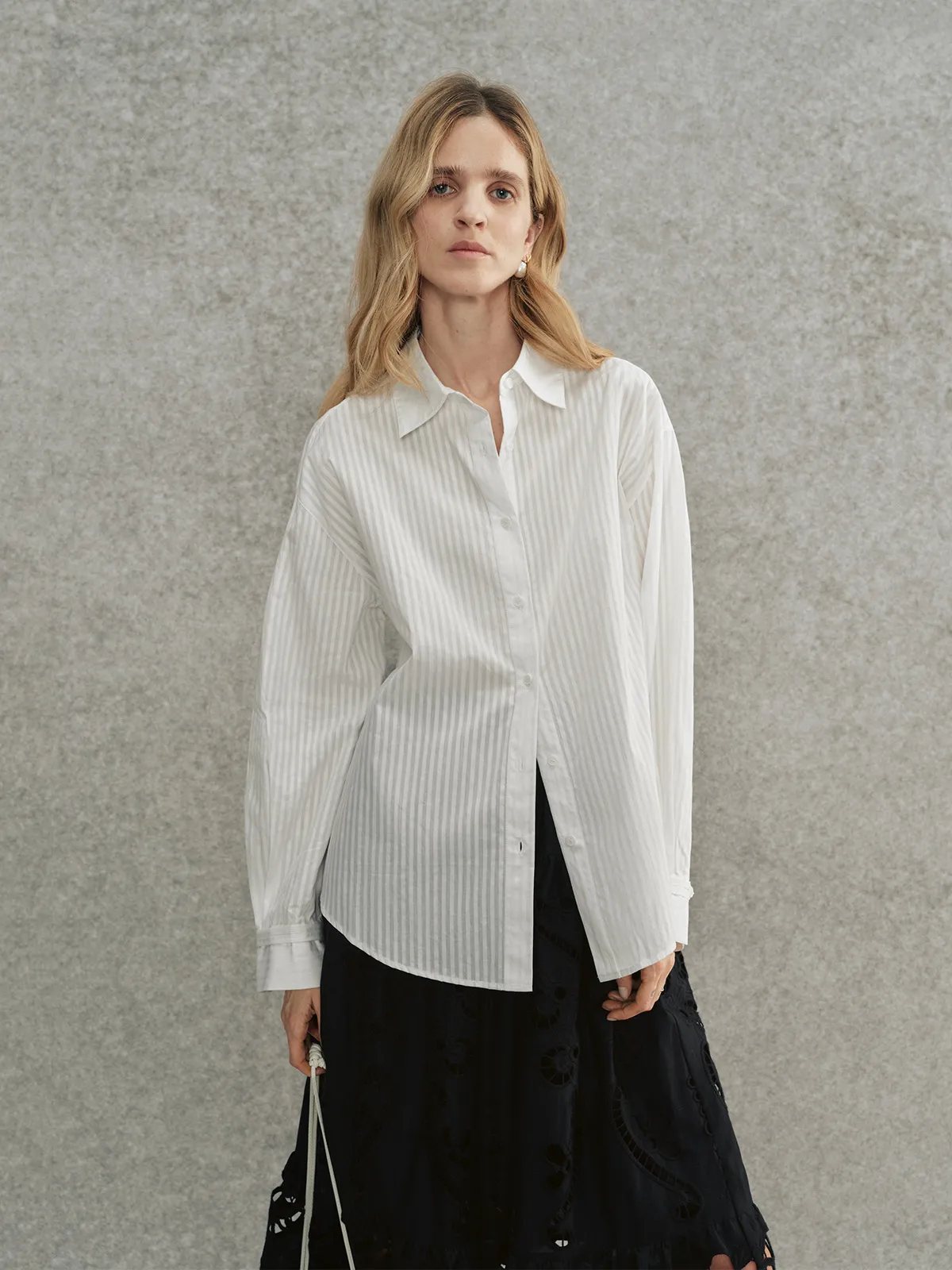 Front pose: KIARA striped shirt worn open over black skirt, hands at sides