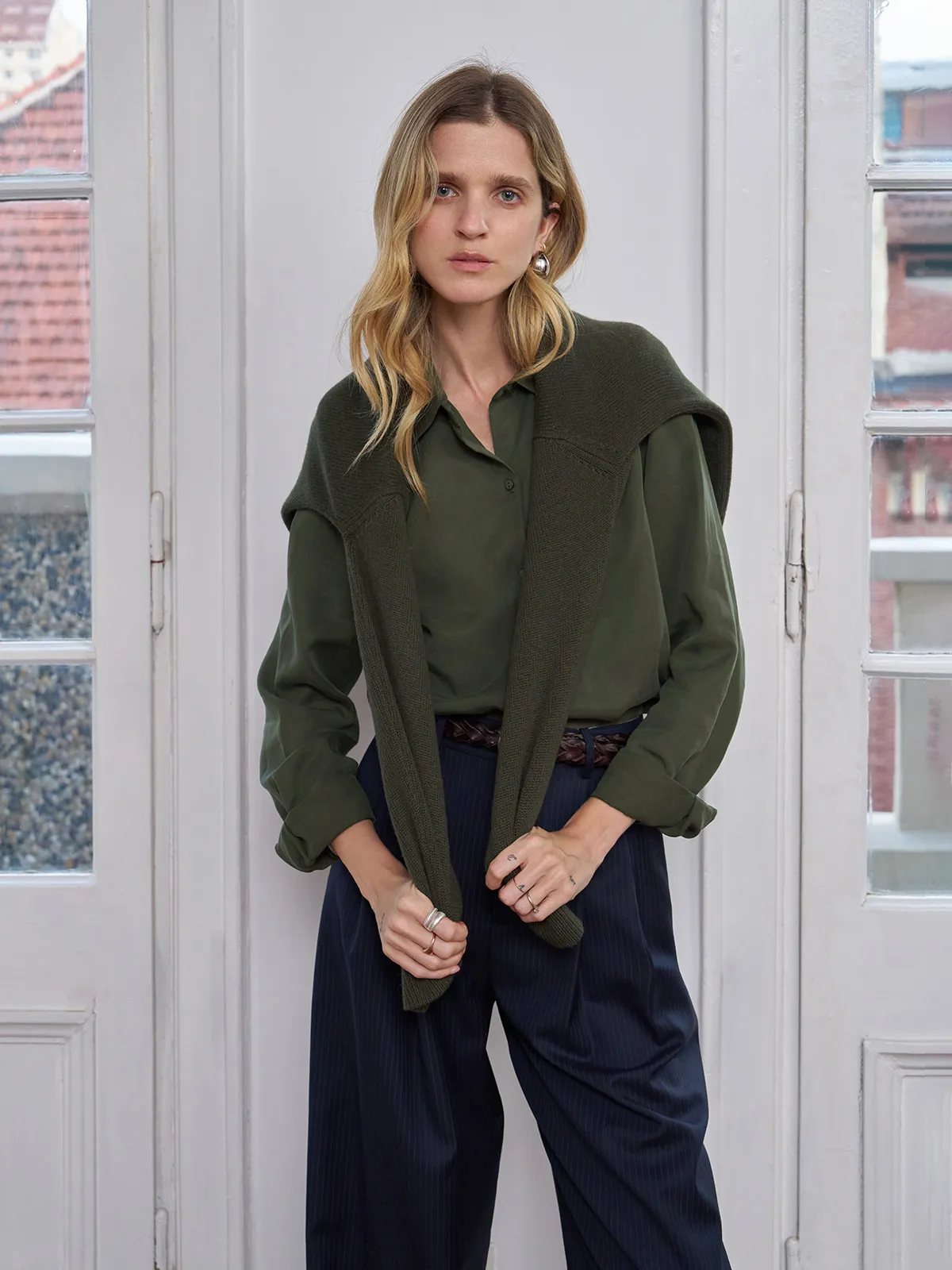 ERIN Lyocell Shirt layered under olive knit vest — versatile layering look for transitional seasons