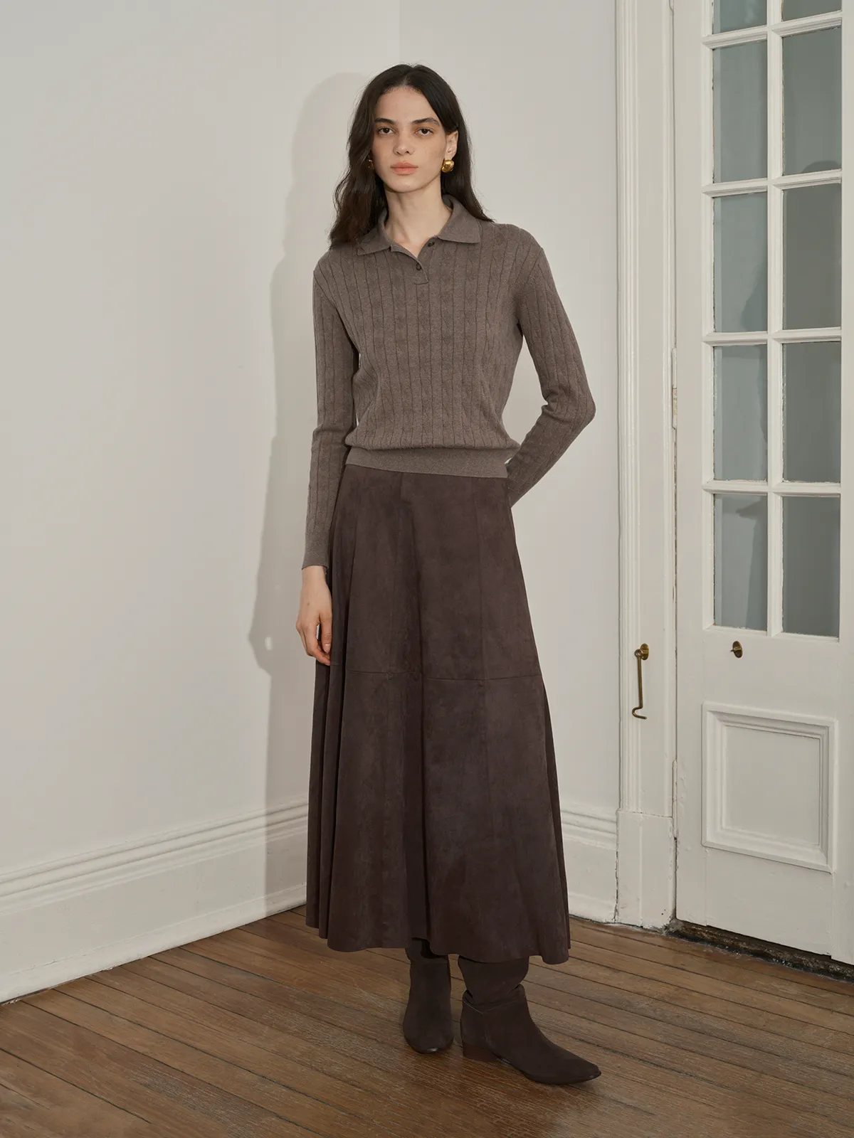 Model in taupe EMERSON Jumper with brown suede midi skirt and matching ankle boots—elegant monochrome autumn ensemble