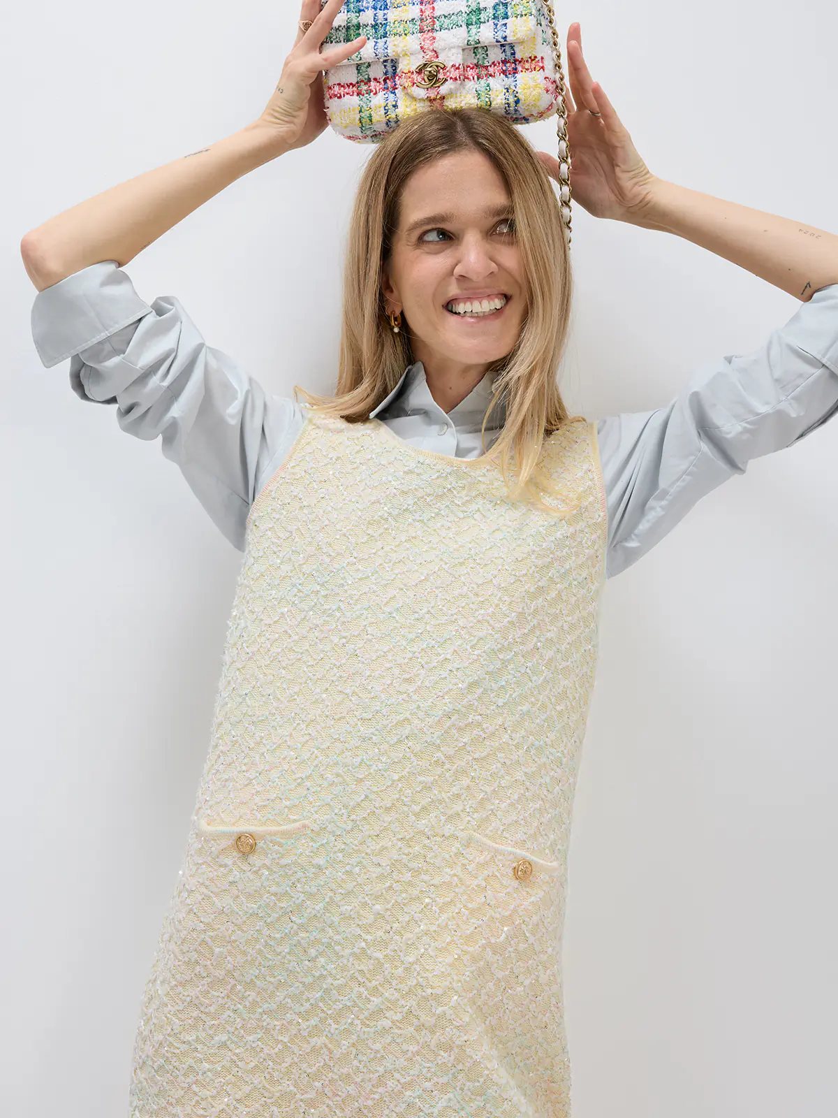 Front view of a model wearing the Beige sequin-embellished dress with a matching fabric scarf draped around the neck.