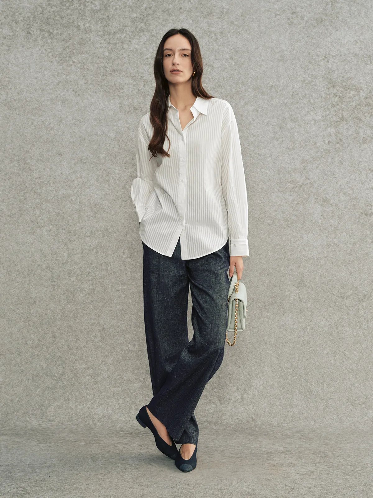 Full-body look: KIARA shirt with dark indigo wide-leg trousers and navy flats