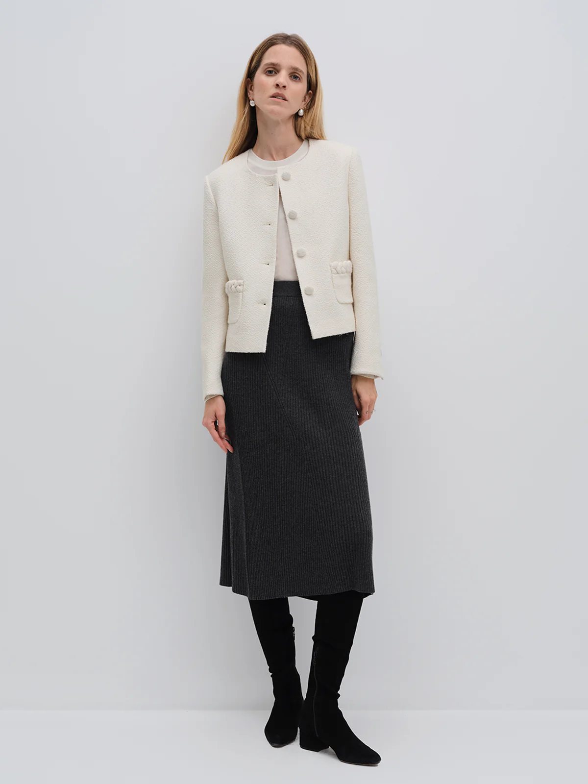 andreatang ivory wool-blend tweed cropped jacket paired with rib-knit midi skirt and knee-high boots