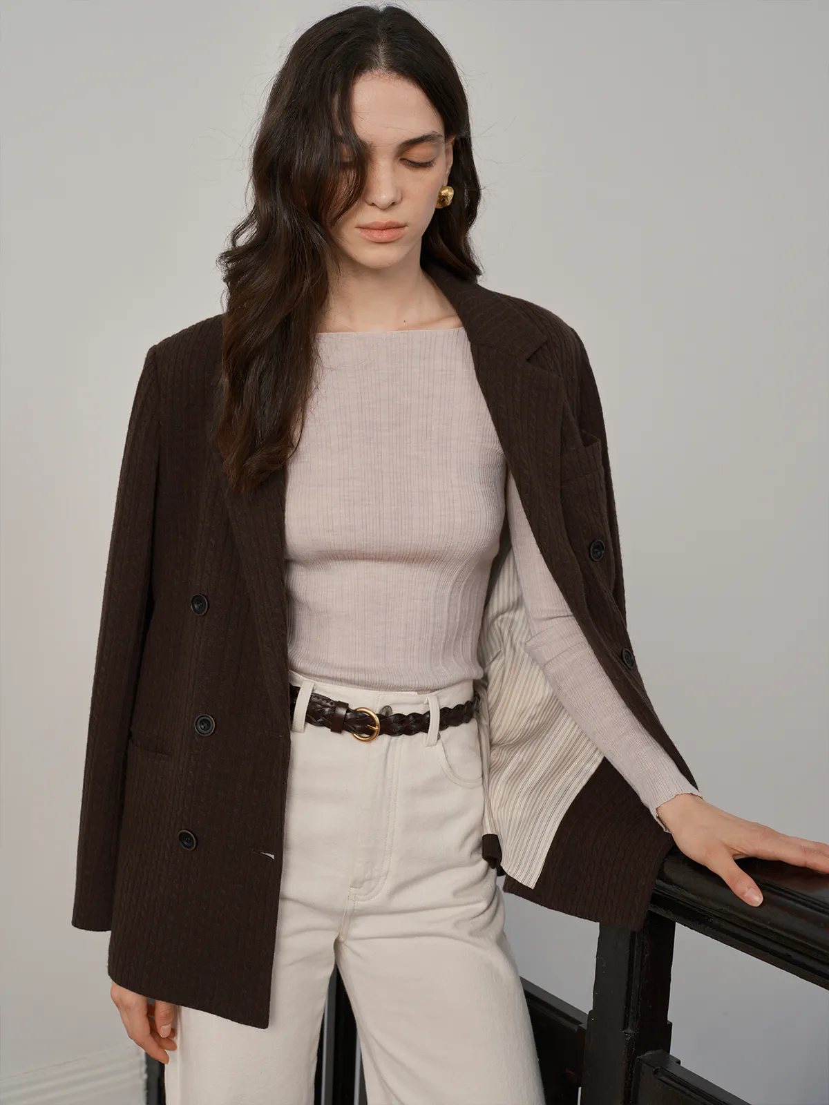 Andreatang THERESA knit top layered under brown textured blazer with white trousers