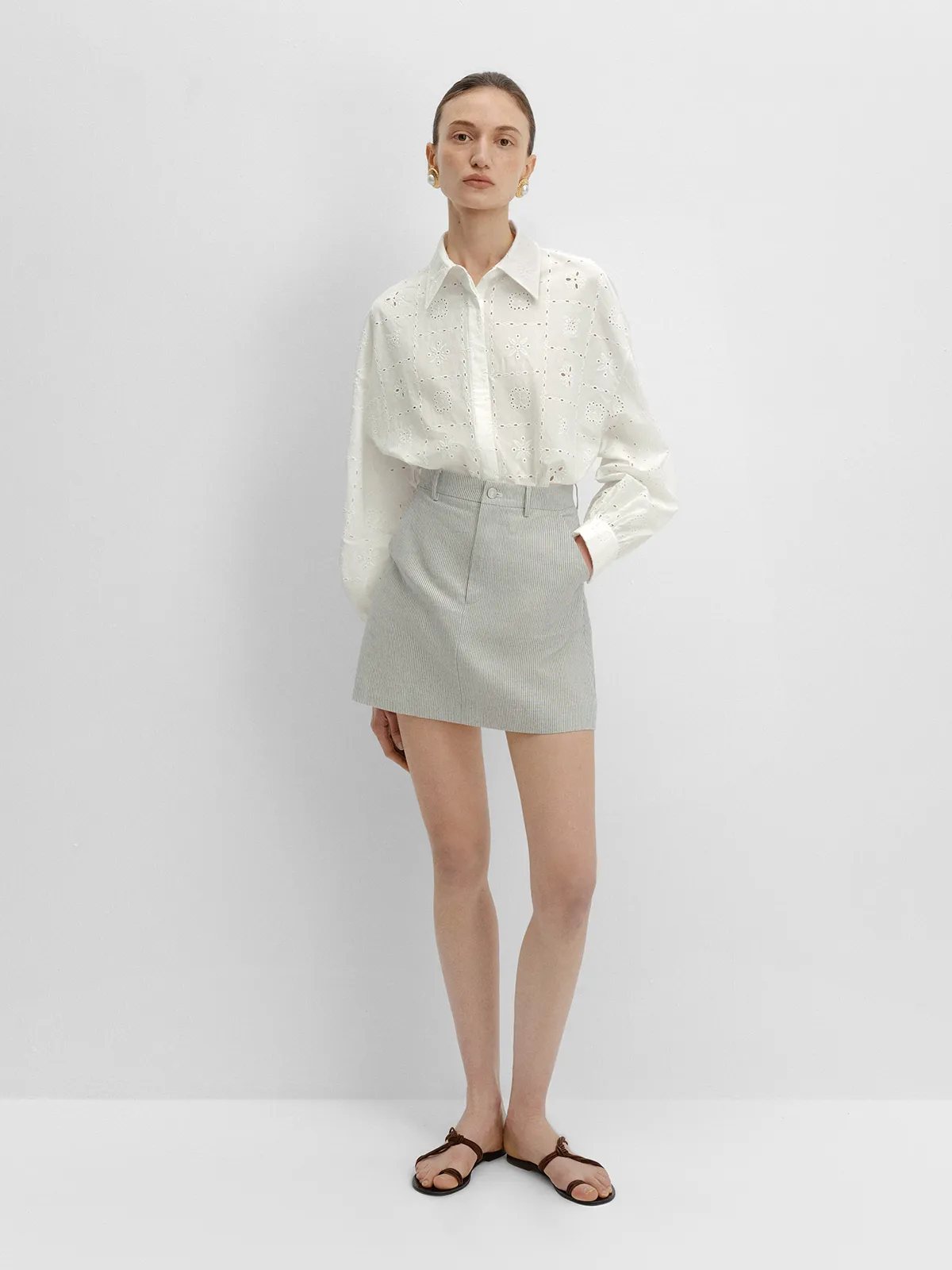 andreatang MINA shirt with grey striped mini skirt, gold earrings, minimalist summer look