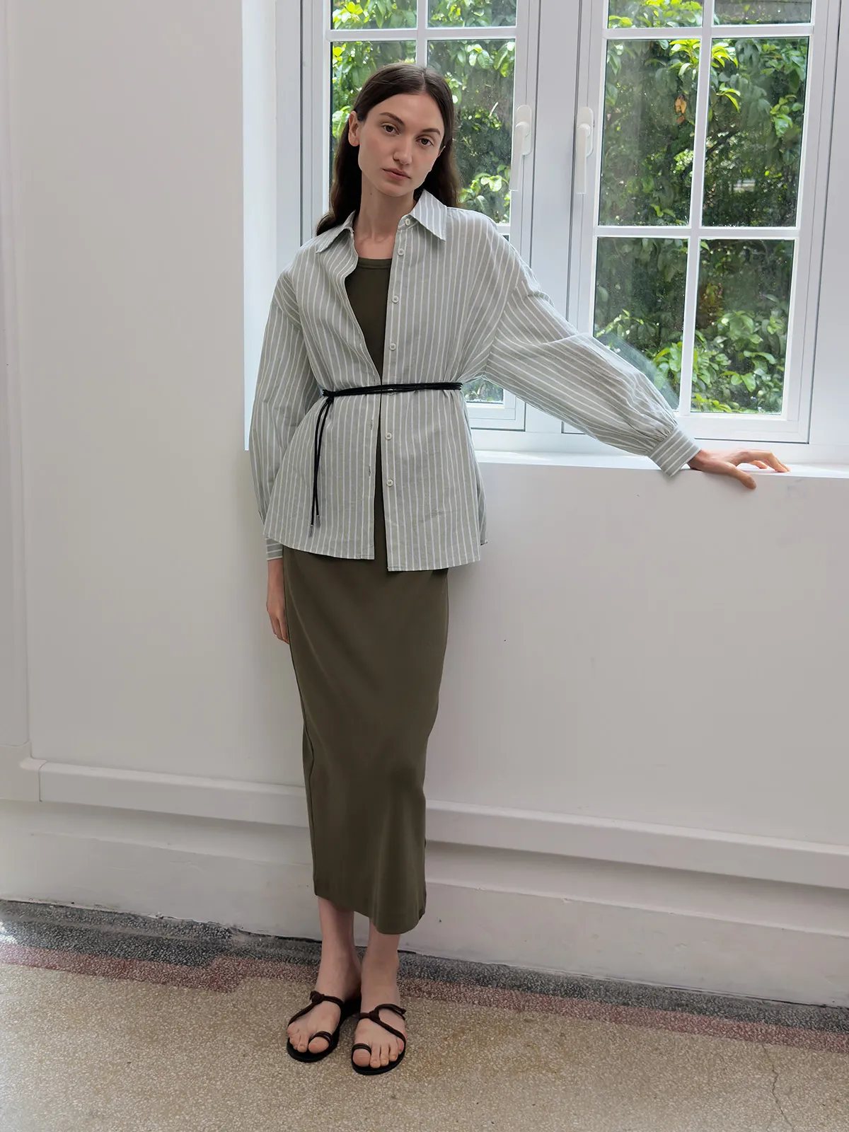 Layered look: olive AUBREY dress under striped oversized shirt with black belt