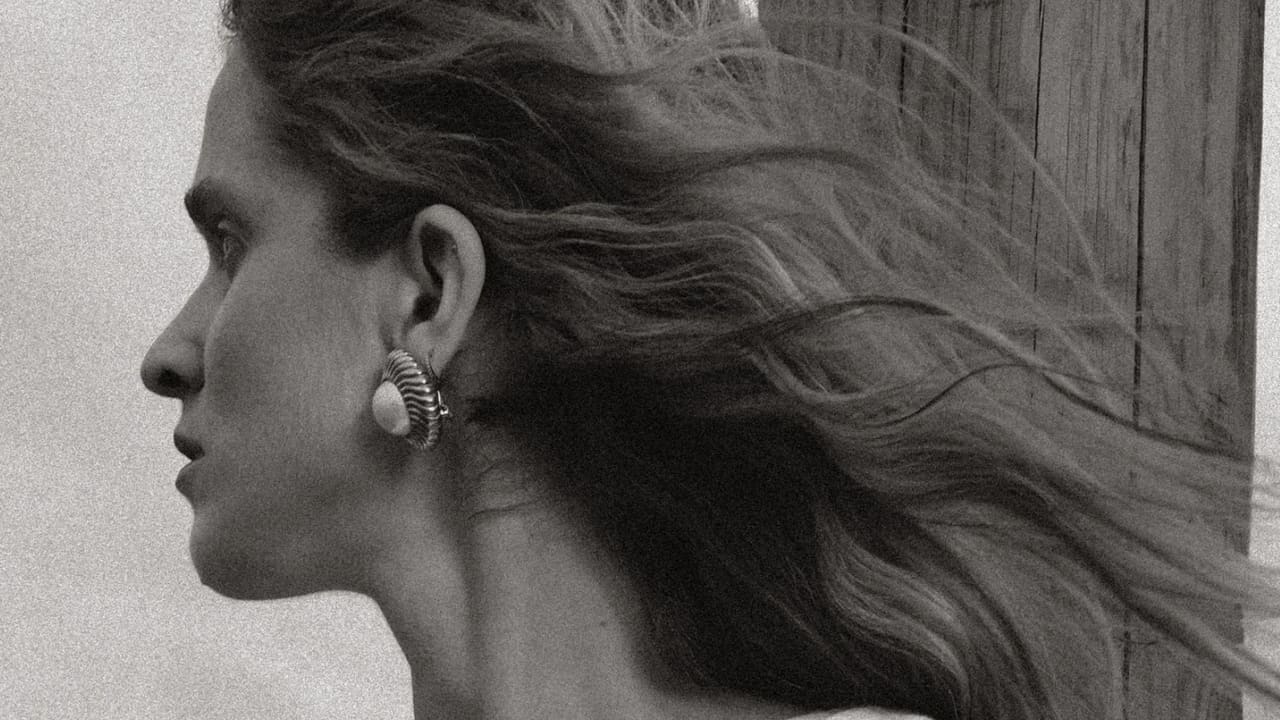 Andrea Tang editorial profile with earrings