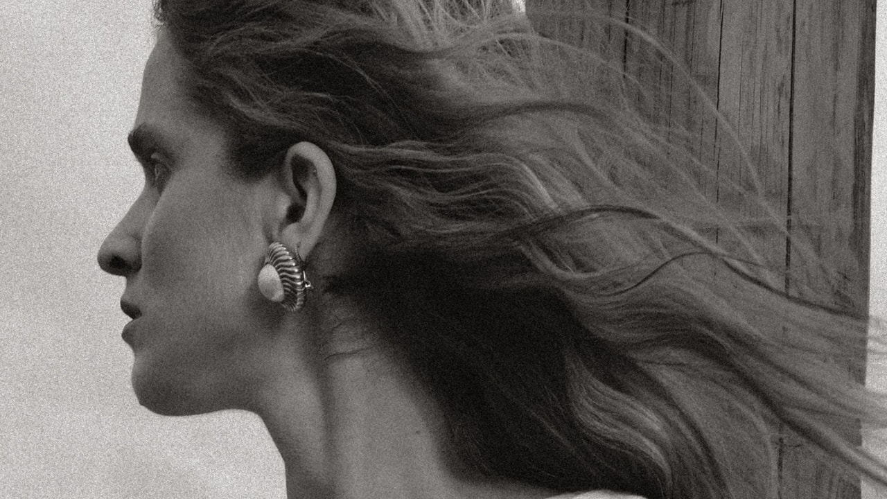 Andrea Tang editorial profile with earrings