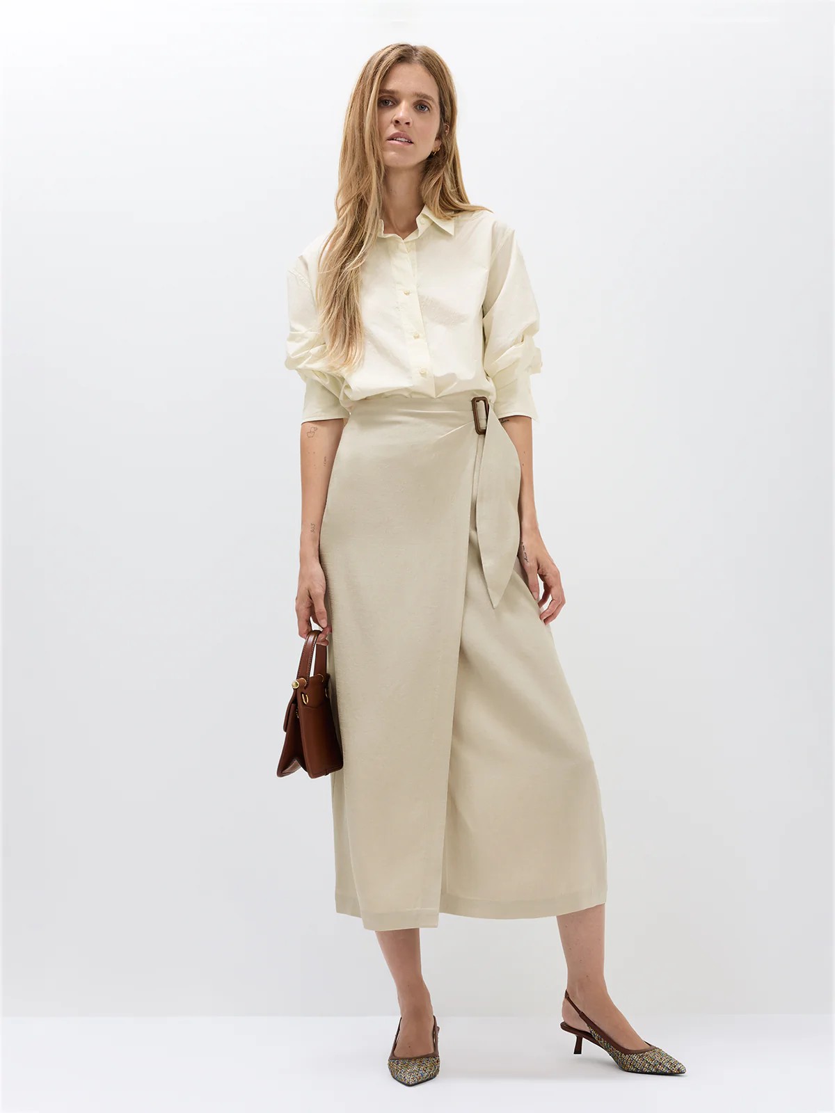 LIORA｜Acetate Wrap Midi Skirt–Model side view-02