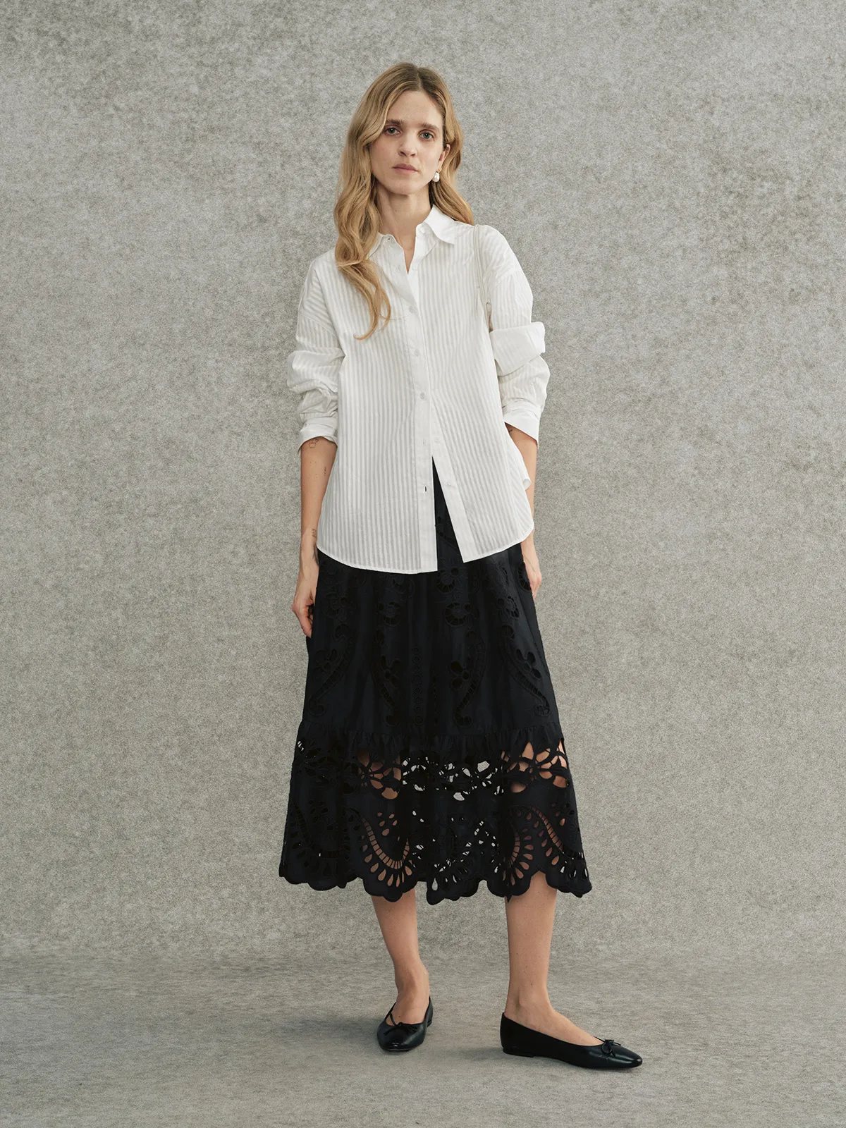 Front full-body look: KIARA shirt with black embroidered lace skirt and black ballet flats