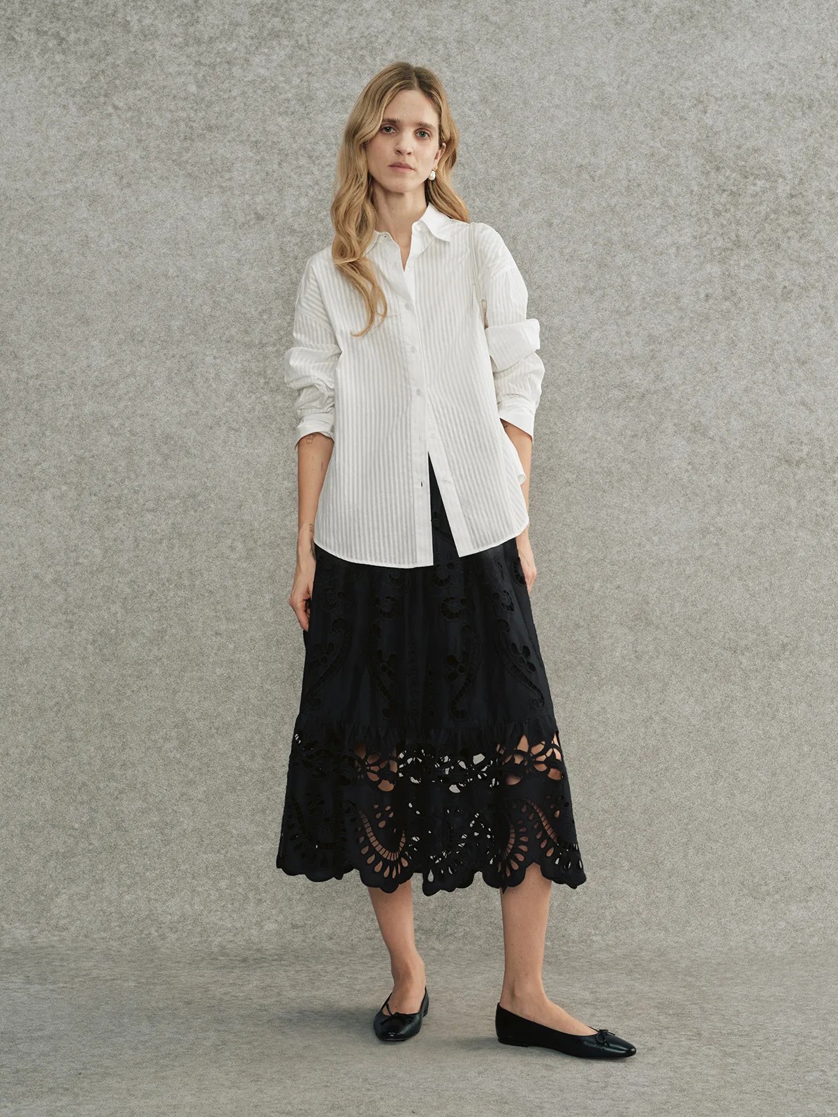 Front full-body look: KIARA shirt with black embroidered lace skirt and black ballet flats