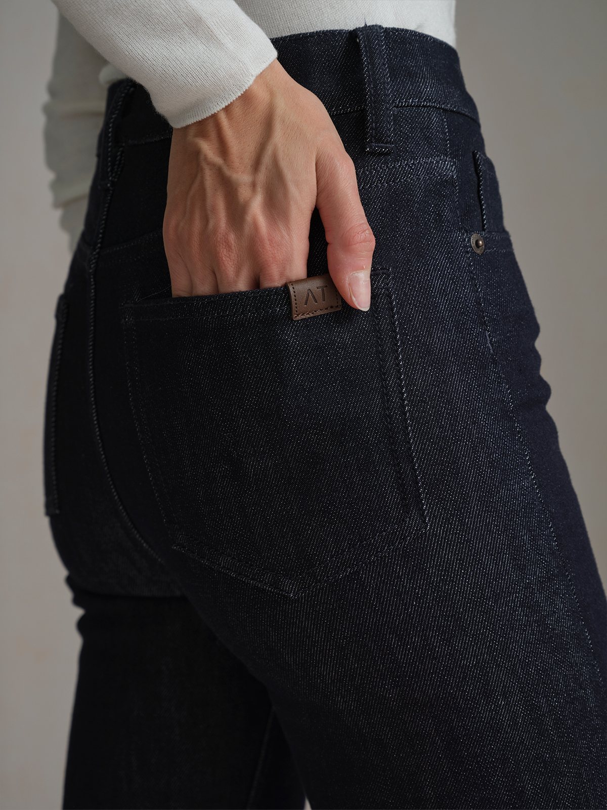 Product View of BRETT Slim Straight-Leg Jeans in Navy.
